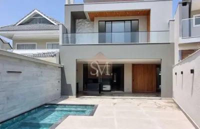 Recreio-casa contemporânea triplex à venda 5 quartos sendo 4 suítes 498m², 3 vagas, piscina-condomínio riviera del sol