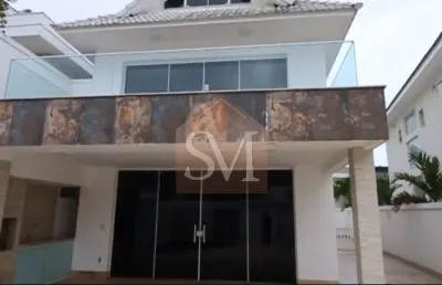 Riviera del sol - casa triplex com 300m² , 5 suítes ,2 vagas de garagem , ampla sala , dependência completa.