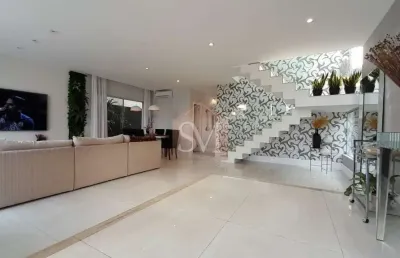 Porteira fechada casa triplex com 3 suítes, 340m², 4 vagas ....