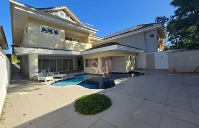 Imponente casa triplex com 4 suítes e placa solar na barra da tijuca, rio de janeiro - 669m² de luxo e conforto