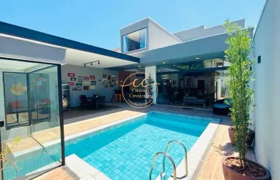 Recreio dos bandeirantes: casa contemporânea à venda com 5 suítes, 380m², 4 vagas, piscina e área gourmet.