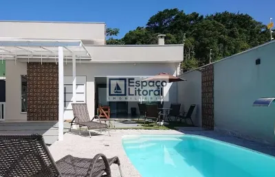 Casa com 3 dormitórios à venda, 107 m² por r$ 960.000,00 - massaguaçu - caraguatatuba/sp