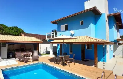 Ubatuba - casa em condomínio fechado a venda com 3 suítes piscina e área gourmet