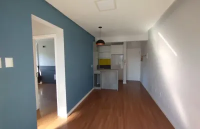 Belíssimo apartamento semi mobiliado com sacada com churrasqueira em areias