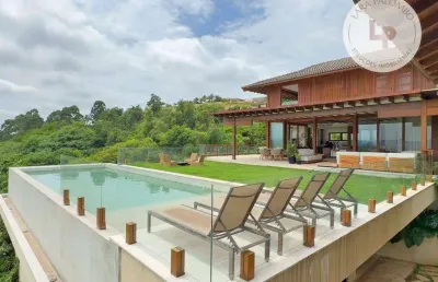 Linda casa a venda no fazenda da grama com 6 suites