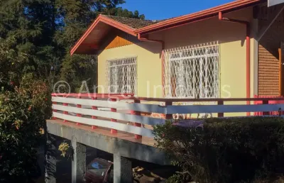 Imóvel com grande área no meio do centro comercial de campos do jordão