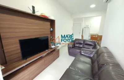 Apartamento com varanda gourmet e vista parcial do mar!