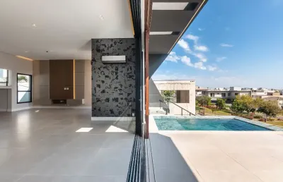 Casa sobrado com elevador e piscina para locação no condomínio alphaville dom pedro 2, em campinas