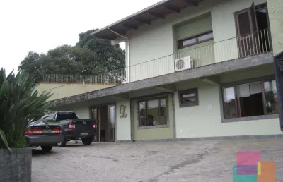 Casa com 3 quartos à venda na rua guilherme tiburtius, --, saguaçu, joinville por r$ 620.000