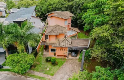 Sobrado com personalidade condominio fechado com 05 suites