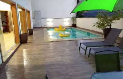 Alphaville 6 - casa com 450m², 4 suítes, 4 vagas, lareira e piscina em santana d