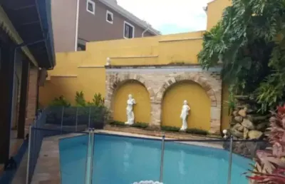 Alphaville 10 - casa com 400m², 4 suítes, 3 vagas e varanda gourmet em santana d