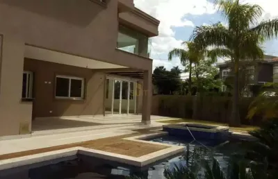 Alphaville 11 - casa com 750m², 7 suítes, 6 vagas e espaço gourmet com piscina e