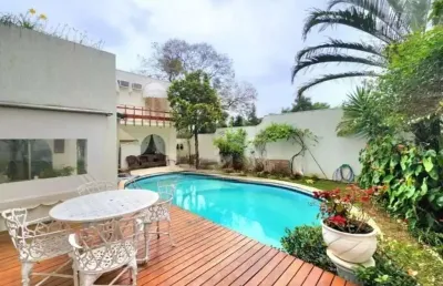 Alphaville 02 - casa com 412m², 4 suítes, 3 vagas, piscina, lareira, jardim em b