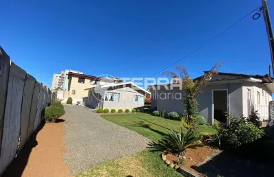 Terreno com casa em pré-moldado contendo 297,05 metros quadrados