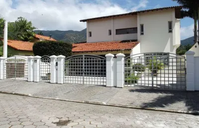 Casa com 3 dormitórios, 420 m² - venda por r$ 1.800.000,00 ou aluguel por r$ 7.000,00/mês - arrastão - são sebastião/sp