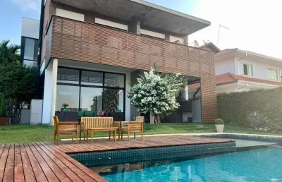 Esta casa deslumbrante oferece uma combinação perfeita de conforto, modernidade condomínio reserva da serra, com uma vista privilegiada
