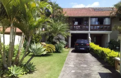 Casa em condomínio fechado com 3 quartos à venda na avenida eduardo prado, 2050, cavalhada, porto alegre, 234 m2 por r$ 975.000