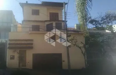 Casa com 3 quartos à venda na rua doutor barbosa gonçalves, 61, chácara das pedras, porto alegre, 296 m2 por r$ 1.060.000