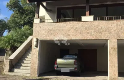 Casa em condomínio fechado com 3 quartos à venda na rua maracá, 240, vila assunção, porto alegre, 555 m2 por r$ 2.450.000