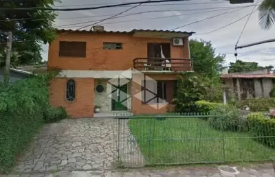 Casa com 3 quartos à venda na rua jacundá, 670, guarujá, porto alegre, 245 m2 por r$ 530.000