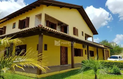 Casa com 5 dormitórios à venda, 509 m² por r$ 1.699.990,00 - parque santa fé - porto alegre/rs