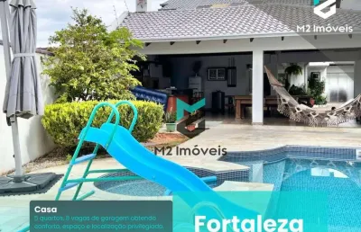 Residência dos sonhos: 5 dormitórios (3 suítes), piscina com água salgada, aquecimento solar, excelente localização!
