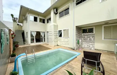 Casa em condomínio fechado com 5 quartos à venda na travessa américa, 68, coqueiros, florianópolis por r$ 2.500.000