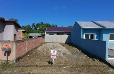 Terreno limpo, aterrado e murado, pronto para construção no bairro itapoá centro de itapoá/sc.