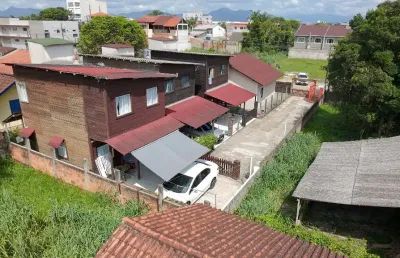4 residências em 1 para venda no bairro jardim pérola do atlântico,  localizado no coração da cidade de itapoá / sc, região centro.