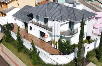 Sobrado com 1 suíte e 2 dormitórios à venda, 300 m² por r$ 2.400.000 - trianon - guarapuava/pr