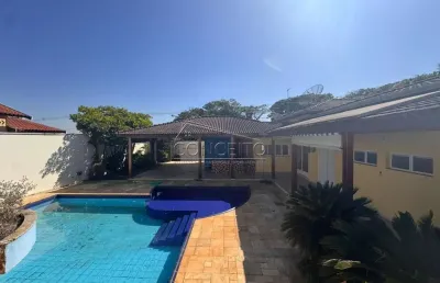 Chácara para venda/locação no condomínio colinas do piracicaba com 323 m² |  4 suítes, piscina com prainha, campo de futebol e 4 vagas de garagem.