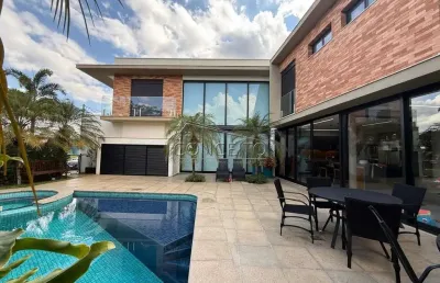 Sobrado de alto padrão à venda no condomínio residencial villa d'aquila com 371 m² | 4 suítes, escritório e 6 vagas de garagem.