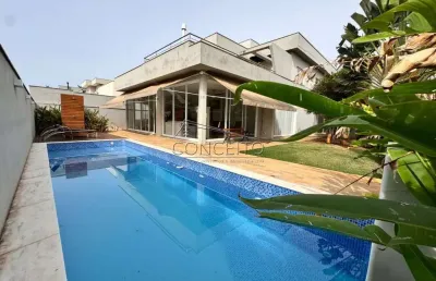 Sobrado à venda no condomínio reserva do engenho com 323,82 m² | 4 suítes, sendo 1 suíte master com closet e varanda e 6 vagas de garagem.