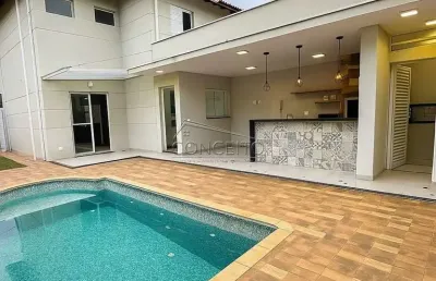 Sobrado à venda no condomínio costa do sol com área construída de 150 m² | 3 dormitórios, sendo 1 suíte , piscina, 2 vagas de garagem.