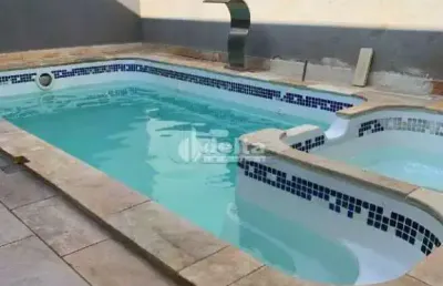 Casa residencial disponível para venda no bairro umuarama em uberlândia-mg