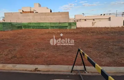 Terreno em condomínio disponível para venda no bairro grand ville em uberlândia-mg