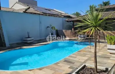 Casa residencial disponível para venda no bairro jardim karaíba em uberlândia-mg