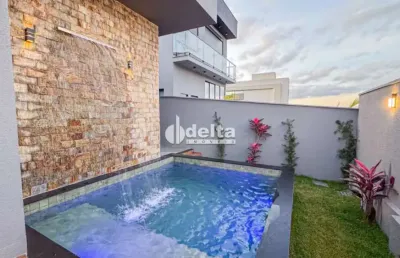 Casa no condomínio terras alpha disponível para venda em uberlândia-mg