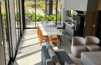 Casa no condomínio terras alpha disponível para venda em uberlândia-mg