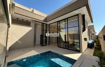 Casa no condomínio golden village disponível para venda em uberlândia-mg