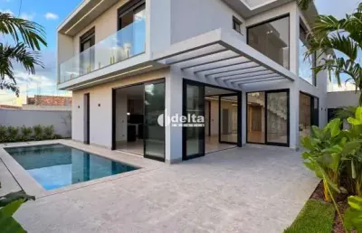 Casa residencial em condomínio disponível para venda no bairro granja marileusa em uberlândia-mg.