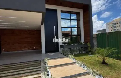 Casa residencial em condomínio disponível para venda no bairro grand ville em uberlândia-mg.