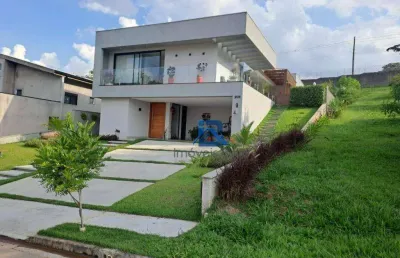 Casa com 3 suites no villaggio paradiso com piscina e ao lado da area de preservação.
