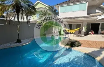 Casa blue house em terreno 650 m², área construída 500 m², 06 suítes, salão de jogos com banheiro, home theater e bar de apoio r$ 5.500.000,00.