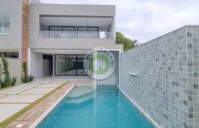 Casa triplex de 360m², 4 suítes no condomínio interlagos de itaúna - barra da tijuca