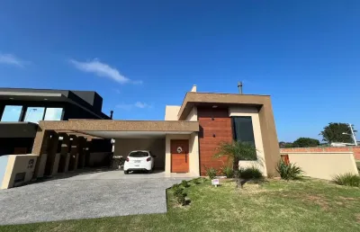 Linda casa terrea com 3 quartos, escritura publica em condominio fechado de alto padrão.