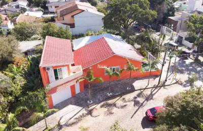 Excelente oportunidade para morar e investir!! casa 100% mobiliada, com garagem para 4 carros!!