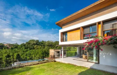 Maravilhosa casa com 4 quartos sendo 1 suíte no rio tavares em florianópolis