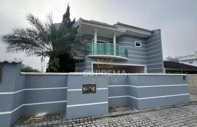 Casa com 4 dormitórios à venda, 300 m² por r$ 1.200.000,00 - iririú - joinville/sc